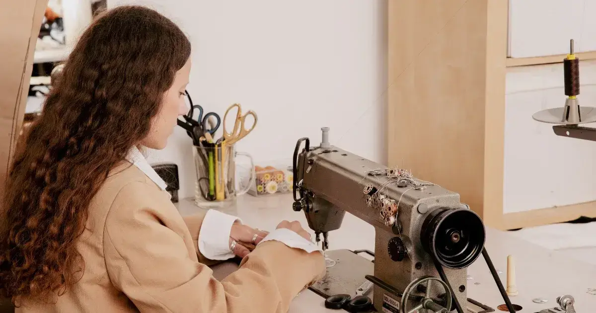 woman using a sewing machine