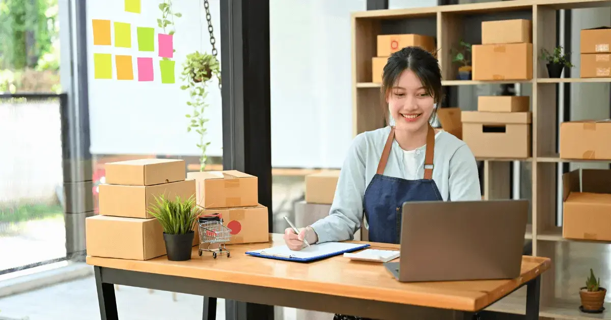 Woman writing in notepad